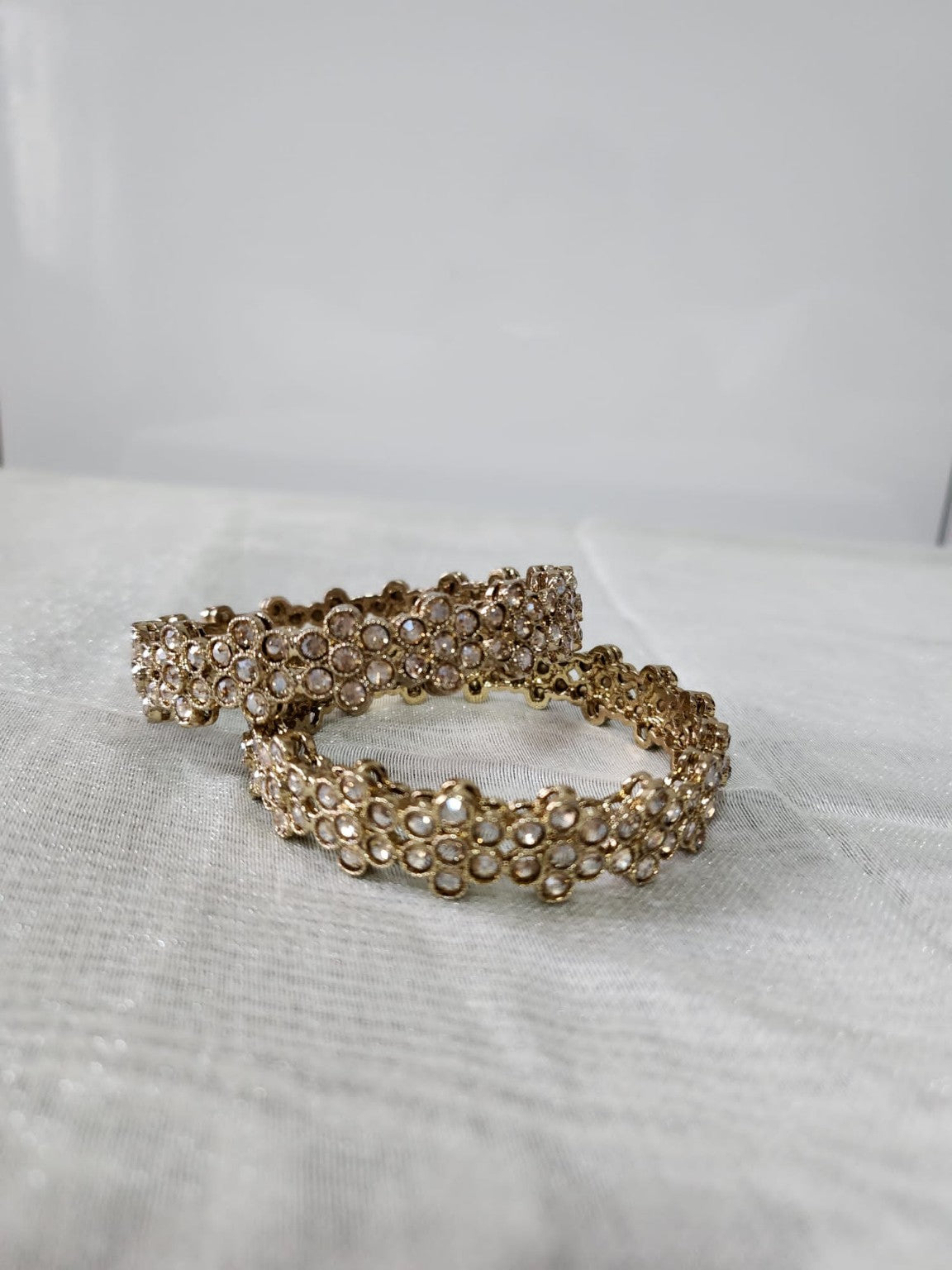 Elegant Gold-Toned Stone-Studded Bangles